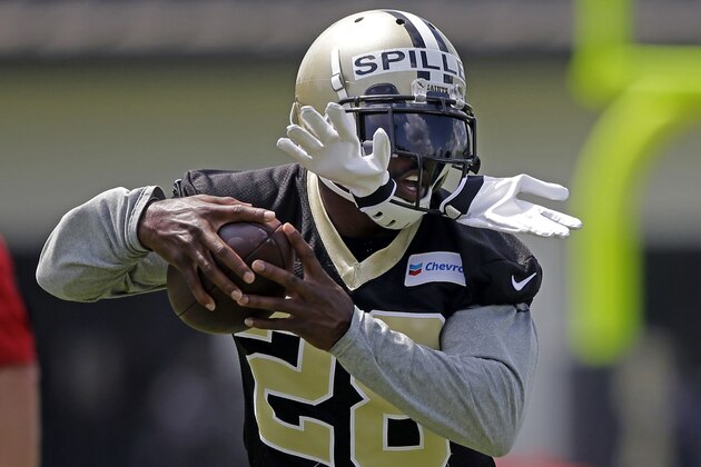 FILE - In this June 4, 2015, file photo, New Orleans Saints running back C.J. Spiller works out during an NFL football organized team activity in Metairie, La. After missing much of last season a shoulder injury, former Buffalo running back has fresh legs and looks ready to be the type of versatile, explosive threat that fits well with the offense of his new team, the Saints.  (AP Photo/Gerald Herbert, File)