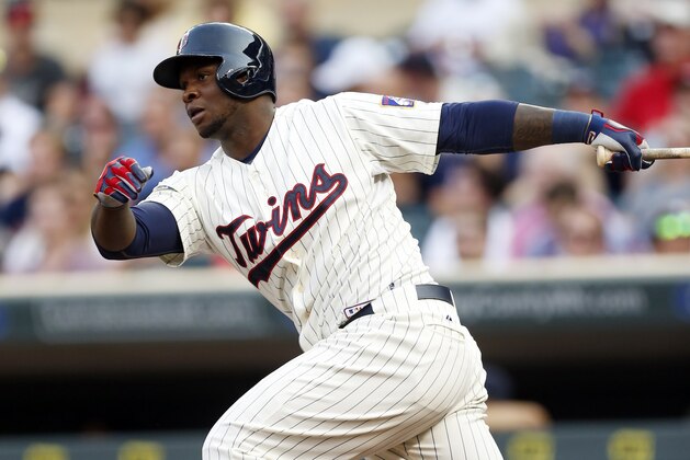 Minnesota Twins’ Miguel Sano bats against the Texas Rangers in the first inning of a baseball game, Wednesday, Aug. 12, 2015, in Minneapolis. (AP Photo/Jim Mone)
