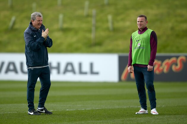 BURTON-UPON-TRENT, ENGLAND - MARCH 24:  Manager Roy Hodgson with Captain Wayne Rooney during an England training session at St Georges Park on March 24, 2015 in Burton-upon-Trent, England.  (Photo by Richard Heathcote/Getty Images)