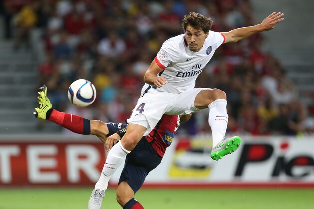 LILLE, FRANCE - AUGUST 7: Benjamin Stambouli of PSG in action during the French Ligue 1 match between Lille OSC (LOSC) and Paris Saint-Germain (PSG) at Grand Stade Pierre Mauroy on August 7, 2015 in Lille, France. (Photo by Jean Catuffe/Getty Images)