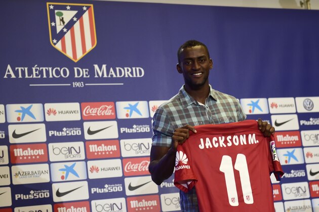 Atletico de Madrid's new football signing Colombian Jakson Martinez poses with his jersey during his presentation at Vicente Calderon stadium in Madrid on July 26, 2015. AFP PHOTO/ PIERRE-PHILIPPE MARCOU        (Photo credit should read PIERRE-PHILIPPE MARCOU/AFP/Getty Images)
