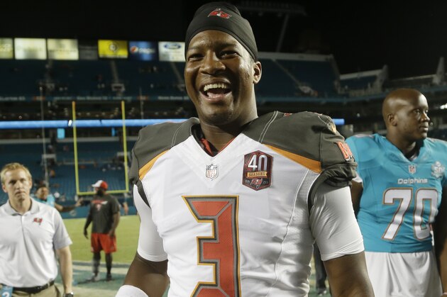 Tampa Bay Buccaneers quarterback Jameis Winston (3) smiles at the end of an NFL preseason football game against the Miami Dolphins, Thursday, Sept. 3, 2015, in Miami Gardens, Fla. (AP Photo/Lynne Sladky)