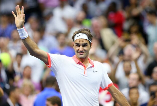 Sep 7, 2015; New York, NY, USA; Roger Federer of Switzerland celebrates after defeating John Isner of the United States on day eight of the 2015 U.S. Open tennis tournament at USTA Billie Jean King National Tennis Center. Mandatory Credit: Jerry Lai-USA TODAY Sports