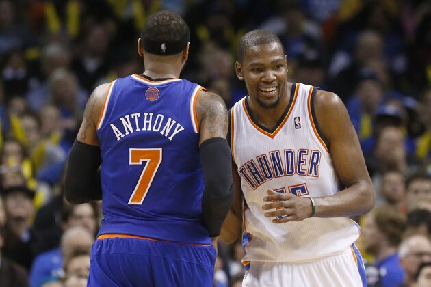 Oklahoma City Thunder forward Kevin Durant (35) laughs as he talks with New York Knicks forward Carmelo Anthony (7) during an NBA basketball game in Oklahoma City, Sunday, Feb. 9, 2014. Oklahoma City won 112-100. (AP Photo/Sue Ogrocki)