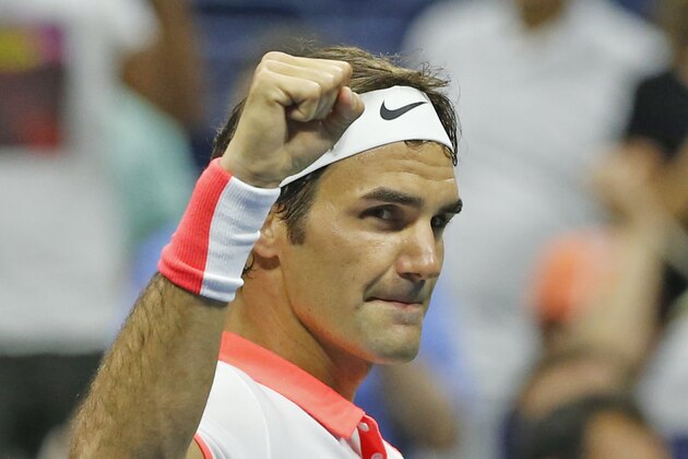 Roger Federer, of Switzerland, reacts after winning his fourth round match against John Isner, 7-6, 7-6, 7-5, at the U.S. Open tennis tournament in New York, Monday, Sept. 7, 2015.  (AP Photo/Kathy Willens)