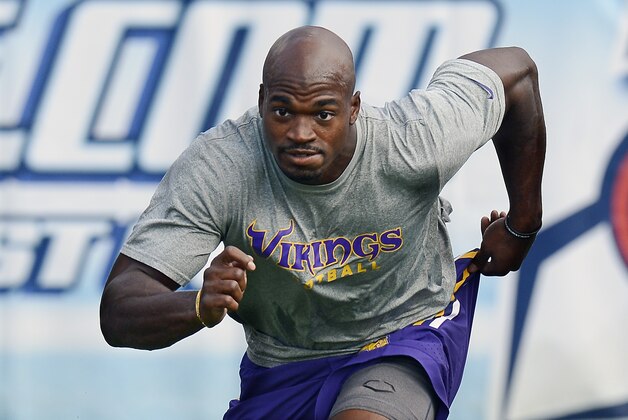 Minnesota Vikings running back Adrian Peterson warms up before a preseason NFL football game against the Tennessee Titans Thursday, Sept. 3, 2015, in Nashville, Tenn. (AP Photo/Mark Zaleski)