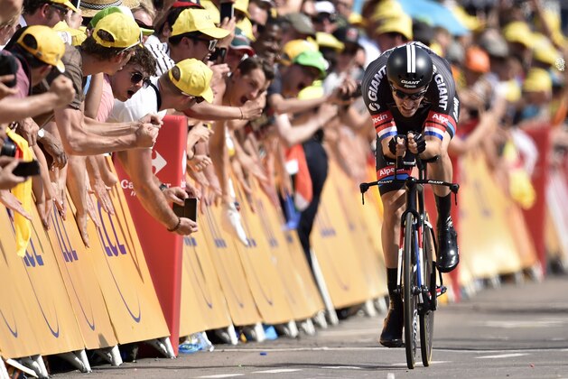 Netherlands' Tom Dumoulin crosses the finish line at the end of a 13.8 km individual time-trial, the first stage of the 102nd edition of the Tour de France cycling race on July 4, 2015, in Utrecht, The Netherlands.  AFP PHOTO / ERIC FEFERBERG        (Photo credit should read ERIC FEFERBERG/AFP/Getty Images)
