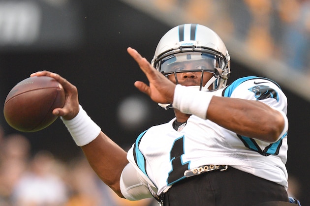 Carolina Panthers quarterback Cam Newton (1) passes during warmup before an NFL football preseason game against the Pittsburgh Steelers, Thursday, Sept. 3, 2015 in Pittsburgh. (AP Photo/Don Wright)