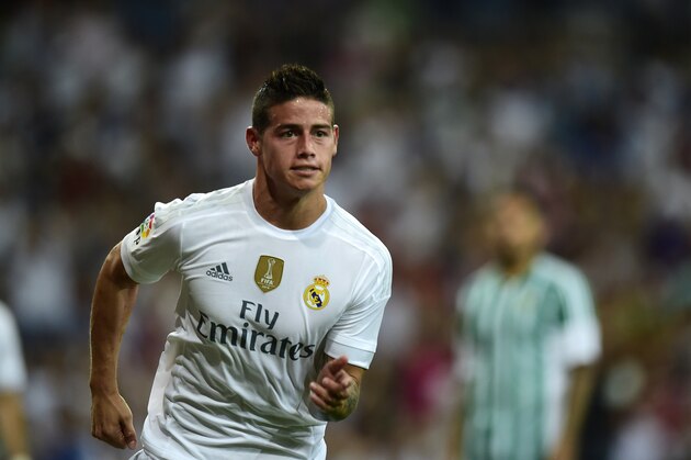 Real Madrid's Colombian midfielder James Rodriguez celebrates after scoring during the Spanish league football match Real Madrid CF vs Real Betis Balompie at the Santiago Bernabeu stadium in Madrid on August 29, 2015.   AFP PHOTO/ PIERRE-PHILIPPE MARCOU        (Photo credit should read PIERRE-PHILIPPE MARCOU/AFP/Getty Images)