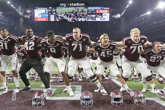 Sep 5, 2015; Houston, TX, USA; Texas A&M Aggies players celebrate after defeating Arizona State Sun Devils at NRG Stadium. Aggies won 38 to 17. Mandatory Credit: Thomas B. Shea-USA TODAY Sports