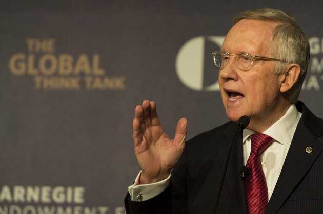 Senate Minority Leader Harry Reid (D-NV) gestures as he speaks about the Iran nuclear deal at the Carnegie Endowment for International Peace in Washington, DC on September 8, 2015. AFP PHOTO/ ANDREW CABALLERO-REYNOLDS        (Photo credit should read Andrew Caballero-Reynolds/AFP/Getty Images)