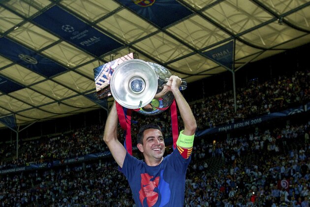 Xavi Hernandez of FC Barcelona with Champions League trophy during the UEFA Champions League  final match between Barcelona and Juventus on June 6, 2015 at the Olympic stadium in Berlin, Germany.(Photo by VI Images via Getty Images)