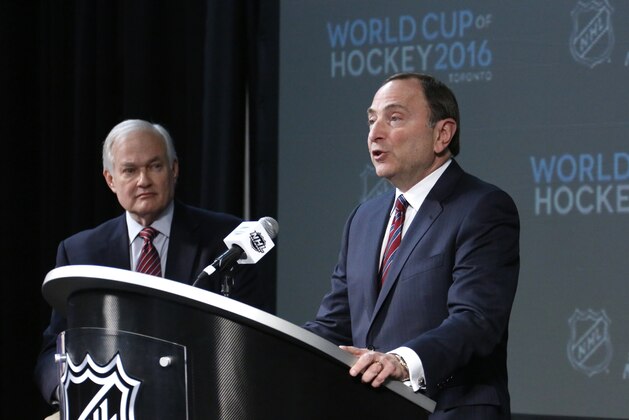 NHL Commissioner Gary Bettman, right, and NHL Player's Association Executive Director Donald Fehr take part in announcing the return of the World Cup of Hockey in 2016 in Toronto, during a news conference at Nationwide Arena in Columbus, Ohio, before the NHL All-Star hockey skills competition, Saturday, Jan. 24, 2015. (AP Photo/Gene J. Puskar)