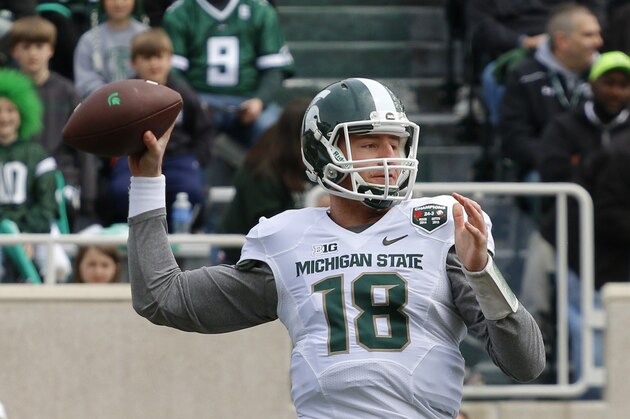 Michigan State White team quarterback Connor Cook throws a pass during the Spartans' spring NCAA college football game, Saturday, April 25, 2015, in East Lansing, Mich. The White team won 9-3. (AP Photo/Al Goldis)