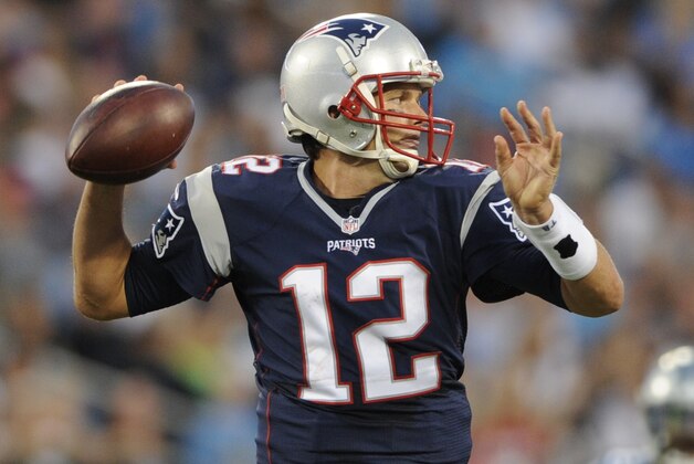 New England Patriots' Tom Brady (12) looks to pass against the Carolina Panthers during the first half of a preseason NFL football game in Charlotte, N.C., Friday, Aug. 28, 2015. (AP Photo/Mike McCarn)
