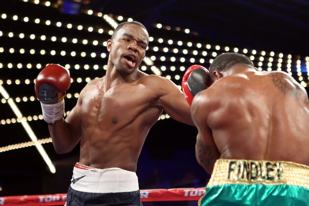Jesse Hart in action against Derrick Findley during their Super Middleweight fight on Saturday, January 25, 2014 in New York City. Hart won via unanimous decision. (AP Photo/Gregory Payan)