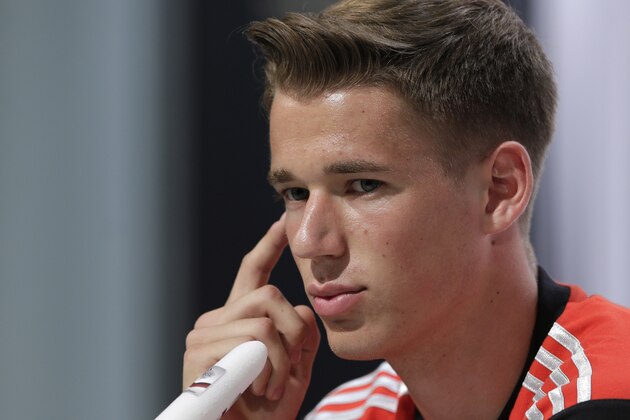 Germany's national soccer player Erik Durm attends a news conference in Santo Andre near Porto Seguro, Brazil, Friday, June 13, 2014. Germany will play in group G of the 2014 soccer World Cup. (AP Photo/Matthias Schrader)