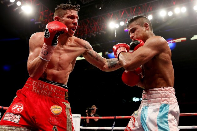 SHEFFIELD, ENGLAND - OCTOBER 26:  Brian Rose (L) in action with Javier Maciel during their Final Eliminator for WBO World Light Middleweight Championship bout at Motorpoint Arena on October 26, 2013 in Sheffield, England.  (Photo by Scott Heavey/Getty Images)