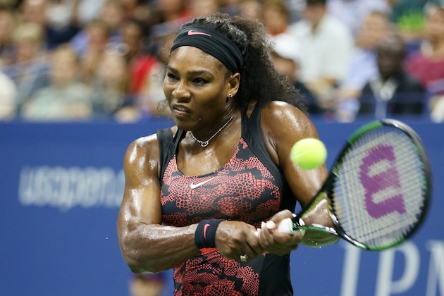 NEW YORK, NY - SEPTEMBER 08:  Serena Williams of the United States returns a shot to Venus Williams of the United States during their Women's Singles Quarterfinals match on Day Nine of the 2015 US Open at the USTA Billie Jean King National Tennis Center on September 8, 2015 in the Flushing neighborhood of the Queens borough of New York City.  (Photo by Matthew Stockman/Getty Images)