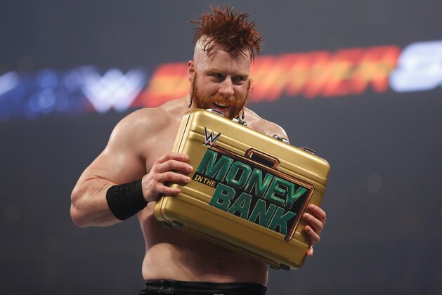 NEW YORK, NY - AUGUST 23:  Sheamus celebrates his victory at the WWE SummerSlam 2015  at Barclays Center of Brooklyn on August 23, 2015 in New York City.  (Photo by JP Yim/Getty Images)