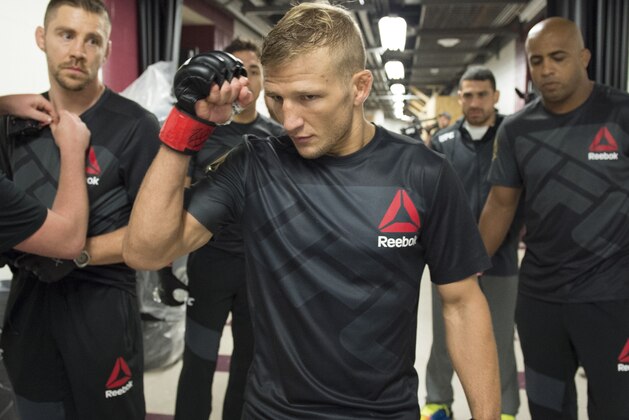 CHICAGO, IL - JULY 25:  UFC bantamweight champion TJ Dillashaw warms up backstage before facing Renan Barao of Brazil in their UFC bantamweight championship bout during the UFC event at the United Center on July 25, 2015 in Chicago, Illinois. (Photo by Mike Roach/Zuffa LLC/Zuffa LLC via Getty Images)