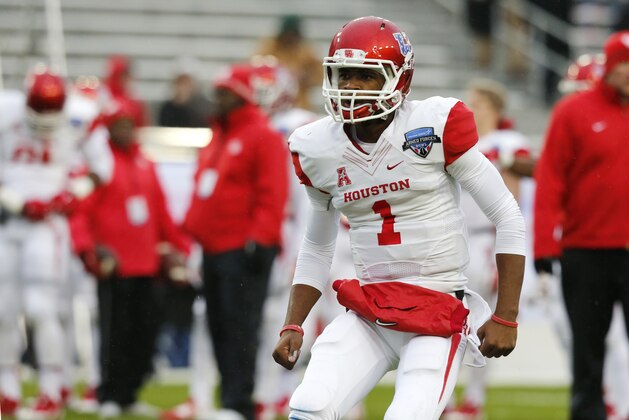 Houston quarterback Greg Ward Jr. (1) during the first half of the Armed Forces Bowl NCAA college football game against Pittsburgh, Friday, Jan. 2, 2015, in Fort Worth. Texas. Houston won 35-34. (AP Photo/Sharon Ellman)
