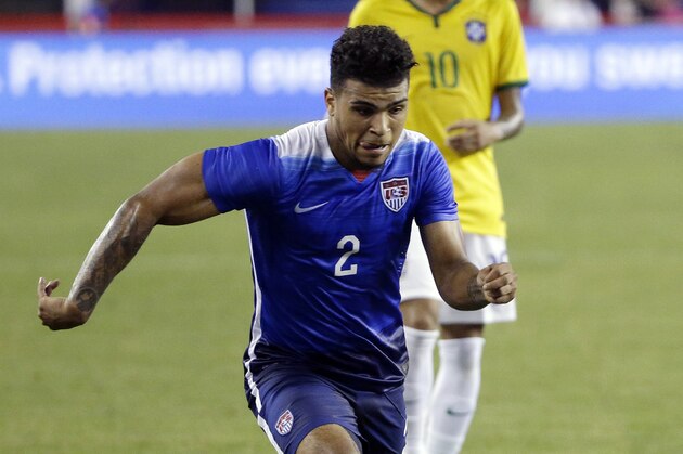 United States’ DeAndre Yedlin dribbles the ball in front of Brazil's Neymar during the second half of their friendly soccer match Tuesday, Sept. 8, 2015, in Foxborough, Mass. (AP Photo/Stephan Savoia)
