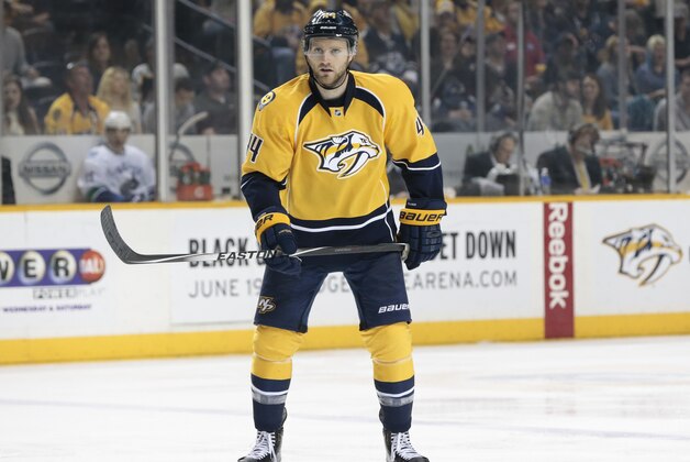 Nashville Predators defenseman Cody Franson plays against the Vancouver Canucks in the third period of an NHL hockey game Tuesday, March 31, 2015, in Nashville, Tenn. (AP Photo/Mark Humphrey)