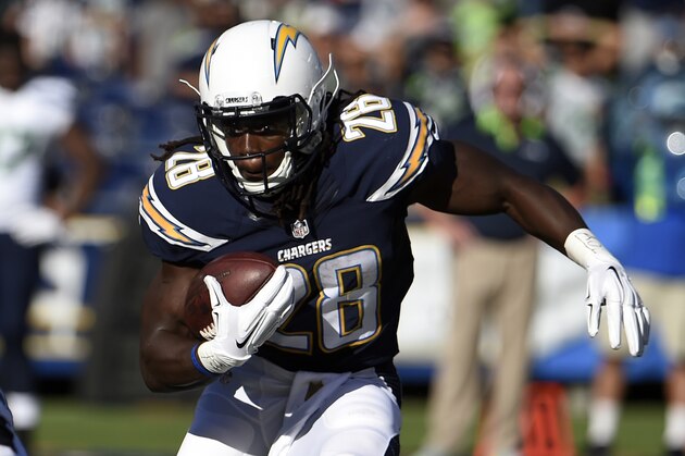 San Diego Chargers running back Melvin Gordon runs against the Seattle Seahawks during the first half of an NFL football game Saturday, Aug. 29, 2015, in San Diego. (AP Photo/Denis Poroy)