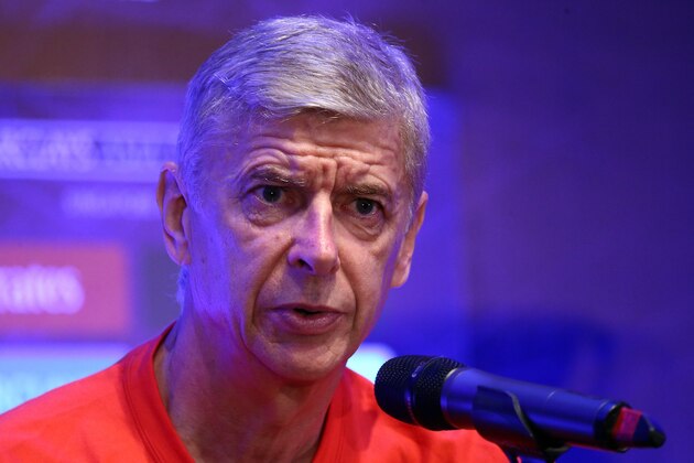 SINGAPORE - JULY 17:  Arsene Wenger Manager of Arsenal speaks to the media during a Barclays Asia Trophy press conference at the Grand Hyatt Hotel on July 17, 2015 in Singapore.  (Photo by Stanley Chou/Getty Images)