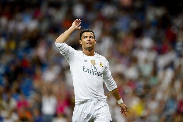 Real Madrid's Portuguese forward Cristiano Ronaldo gestures during the Trofeo Santiago Bernabeu football match Real Madrid vs Galatasaray at the Santiago Bernabeu stadium in Madrid on August 18, 2015.  AFP PHOTO / DANI POZO        (Photo credit should read DANI POZO/AFP/Getty Images)