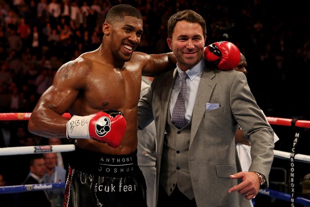 LONDON, ENGLAND - MAY 30:  Anthony Joshua of England poses with Promoter Eddie Hearn following his WBC International Heavyweight bout against Kevin Johnson of The USA at The O2 Arena on May 30, 2015 in London, England.  (Photo by Ben Hoskins/Getty Images)