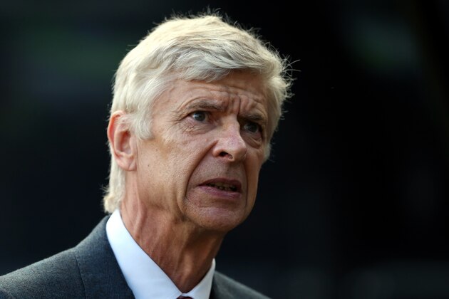 Arsenal's manager Arsene Wenger awaits the start of their English Premier League soccer match between Newcastle United and Arsenal at St James' Park, Newcastle, England, Saturday, Aug. 29, 2015. (AP Photo/Scott Heppell)