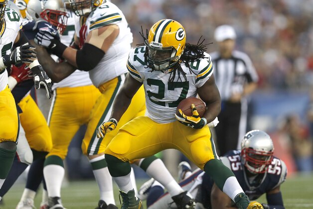 Green Bay Packers running back Eddie Lacy (27) runs against the New England Patriots in the first half of an NFL preseason football game Thursday, Aug. 13, 2015, in Foxborough, Mass. (AP Photo/Michael Dwyer)