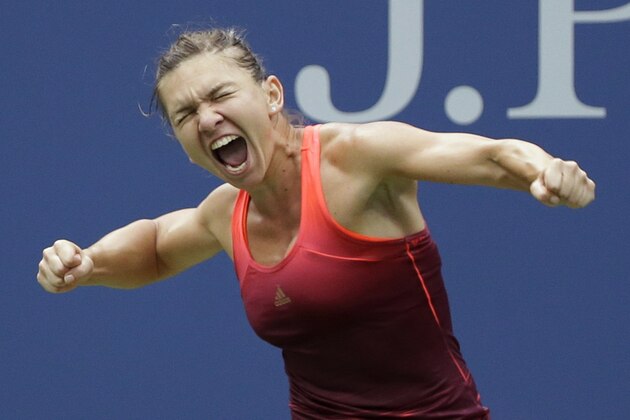 Simona Halep, of Romania, reacts after beating Victoria Azarenka, of Belarus, during a quarterfinal match at the U.S. Open tennis tournament, Wednesday, Sept. 9, 2015, in New York. (AP Photo/Seth Wenig)