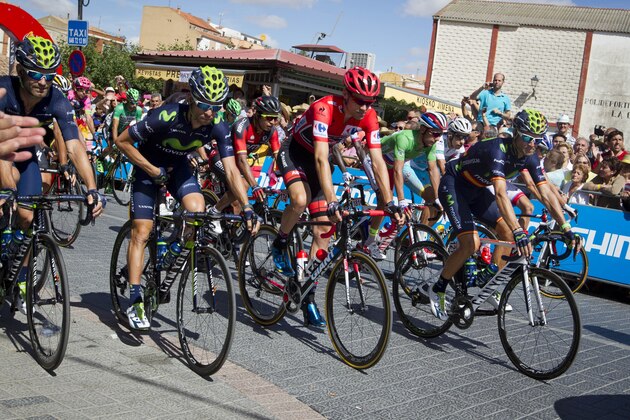 The pack ride in Roa during the 18th stage of the 2015 Vuelta Espana cycling tour, a 204 km route between Roa and Riaza on September 10, 2015. AFP PHOTO / JAIME REINA        (Photo credit should read JAIME REINA/AFP/Getty Images)