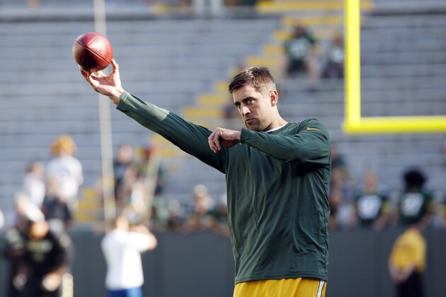 Green Bay Packers quarterback Aaron Rodgers warms up before a preseason NFL football game against the New Orleans Saints Thursday, Sept. 3, 2015, in Green Bay, Wis. (AP Photo/Mike Roemer)