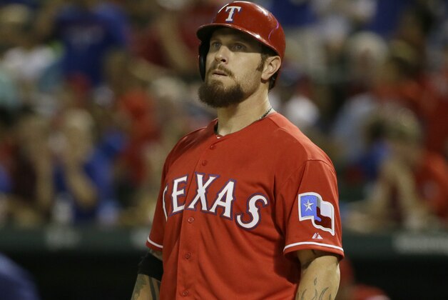 Texas Rangers Josh Hamilton prepares to bat during the eighth inning of a baseball game against the Tampa Bay Rays in Arlington, Texas, Friday, Aug. 14, 2015. (AP Photo/LM Otero)