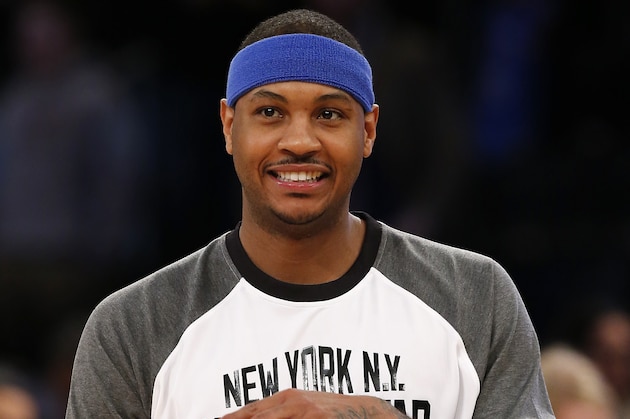 East Team's Carmelo Anthony, of the New York Knicks, walk son the court prior to the start of the NBA All-Star basketball game, Sunday, Feb. 15, 2015, in New York. (AP Photo/Kathy Willens)