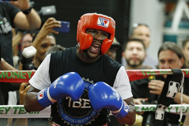Floyd Mayweather Jr. works out at his gym Wednesday, Aug. 26, 2015, in Las Vegas. Mayweather is scheduled to fight Andre Berto in a welterweight title bout next month in Las Vegas. (AP Photo/John Locher)