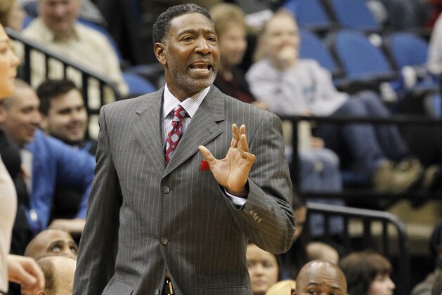 Minnesota Timberwolves assistant coach Sam Mitchell calls out to his players as he fills in for ill head coach Flip Saunders during the first quarter of an NBA basketball game against the Denver Nuggets in Minneapolis, Monday, Jan. 5, 2015. (AP Photo/Ann Heisenfelt)