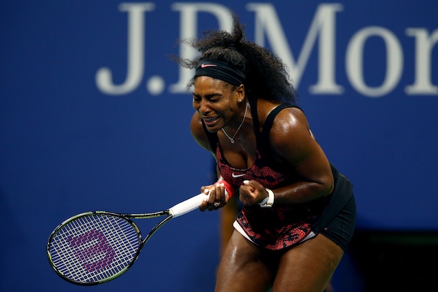 NEW YORK, NY - SEPTEMBER 08:  Serena Williams of the United States reacts against Venus Williams of the United States during their Women's Singles Quarterfinals match on Day Nine of the 2015 US Open at the USTA Billie Jean King National Tennis Center on September 8, 2015 in the Flushing neighborhood of the Queens borough of New York City.  (Photo by Clive Brunskill/Getty Images)