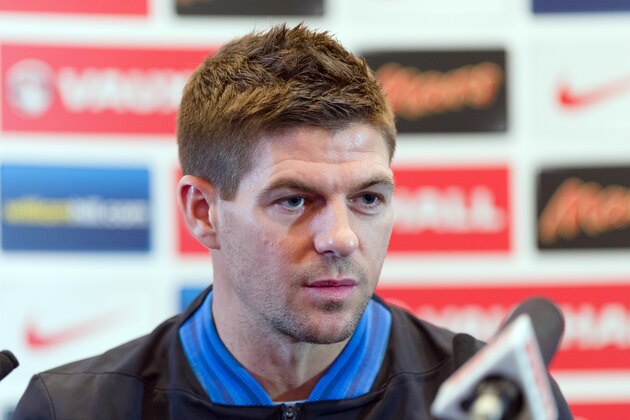 England captain Steve Gerrard holds a press conference with manager Roy Hodgson in central London on February 5, 2013 ahead of their team's international friendly football match against Brazil on February 6.  AFP PHOTO/Leon Neal  == NOT FOR MARKETING OR ADVERTISING USE / RESTRICTED TO EDITORIAL USE ==        (Photo credit should read LEON NEAL/AFP/Getty Images)