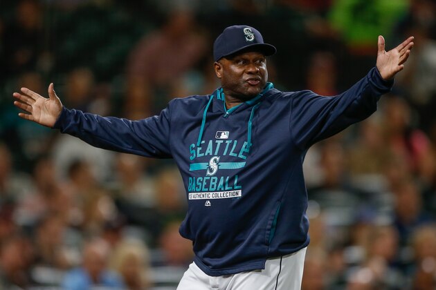 SEATTLE, WA - SEPTEMBER 09:  Manager Lloyd McClendon #21 of the Seattle Mariners gestures as he asks for a replay review after Robinson Chirinos of the Texas Rangers was hit by a pitch in the fifth inning at Safeco Field on September 9, 2015 in Seattle, Washington. The call stood and Chirinos was awarded first base on the play.  (Photo by Otto Greule Jr/Getty Images)