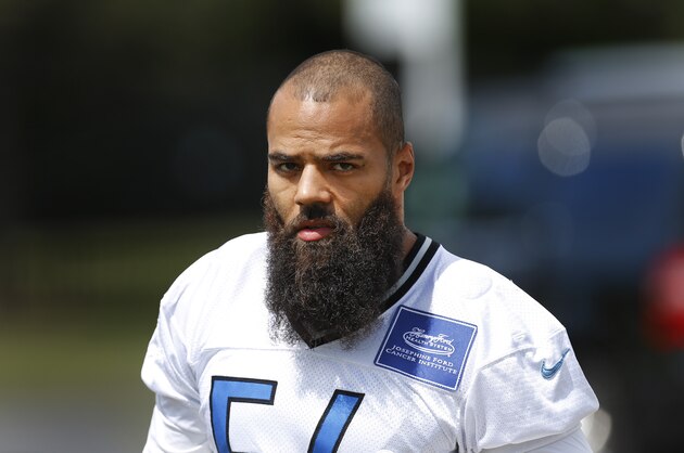 Detroit Lions line backer DeAndre Levy walks to practice during NFL football training camp in Allen Park, Mich., Tuesday, Aug. 4, 2015.  (AP Photo/Paul Sancya)