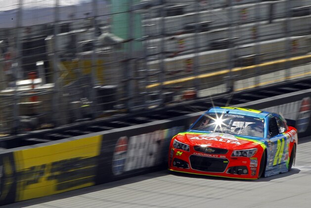 Driver Jeff Gordon crosses the starting line during practice for the NASCAR Sprint Cup Series Irwin Tools Night Race, Friday, Aug. 21, 2015, in Bristol, Tenn. (AP Photo/Wade Payne)