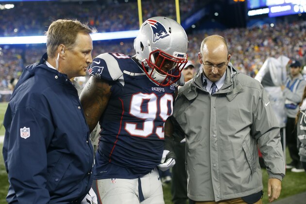 New England Patriots defensive end Dominique Easley (99) is assisted to the locker room after an injury in the first half of an NFL football game against the Pittsburgh Steelers, Thursday, Sept. 10, 2015, in Foxborough, Mass. (AP Photo/Winslow Townson)
