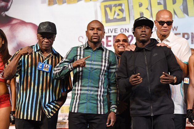 LAS VEGAS, NV - SEPTEMBER 09:  (L-R) Trainer Floyd Mayweather Sr., his son, boxer Floyd Mayweather Jr., CEO of Mayweather Promotions Leonard Ellerbe, boxer Andre Berto and his trainer Virgil Hunter pose during a news conference at MGM Grand Hotel & Casino on September 9, 2015 in Las Vegas, Nevada. Mayweather Jr. will defend his WBC/WBA welterweight titles against Berto on September 12 at MGM Grand in Las Vegas.  (Photo by Ethan Miller/Getty Images)