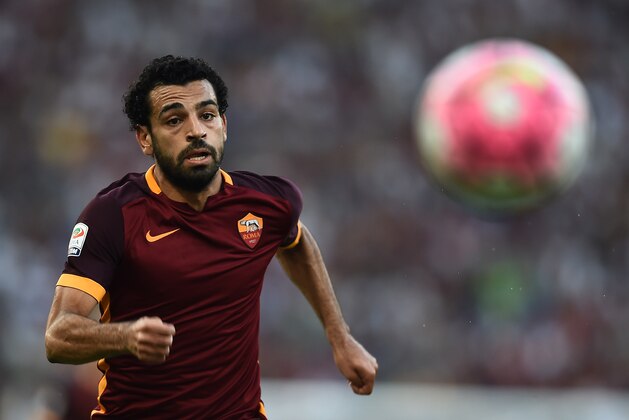 Roma's midfielder from Egypt Mohamed Salah eyes the ball during the Italian Serie A football match AS Roma vs Juventus on August 30, 2015 at the Olympic stadium in Rome.   AFP PHOTO / FILIPPO MONTEFORTE        (Photo credit should read FILIPPO MONTEFORTE/AFP/Getty Images)