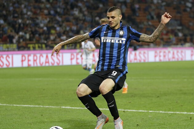 Inter Milan's Mauro Icardi controls the ball during the Serie A soccer match between Inter Milan and Empoli at the San Siro stadium in Milan, Italy, Sunday, May 31, 2015. (AP Photo/Antonio Calanni)